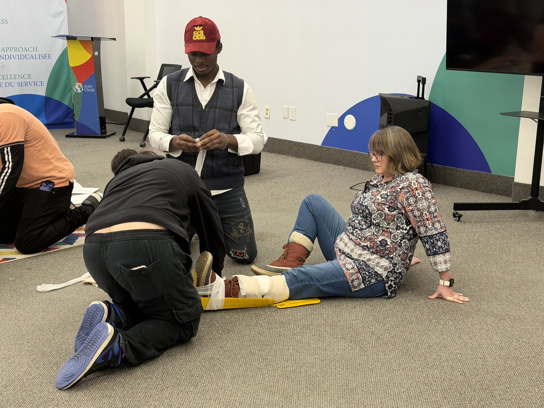 Hands-on CPR practice on a manikin